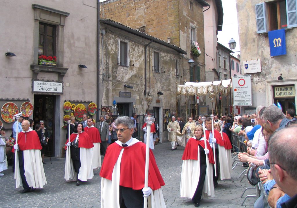  The Eucharist and Corporal of the Miracle of Corpus Christi are carried in procession in Orvieto.