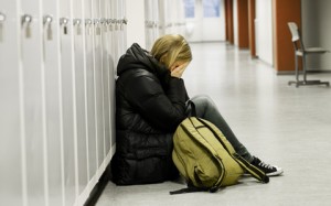 girl-crying-at-locker-featured-w480x300