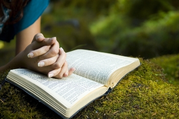 Woman at Prayer with Bible